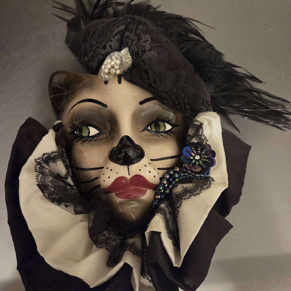 Elegant Cat Face Mask with Black and White Accents